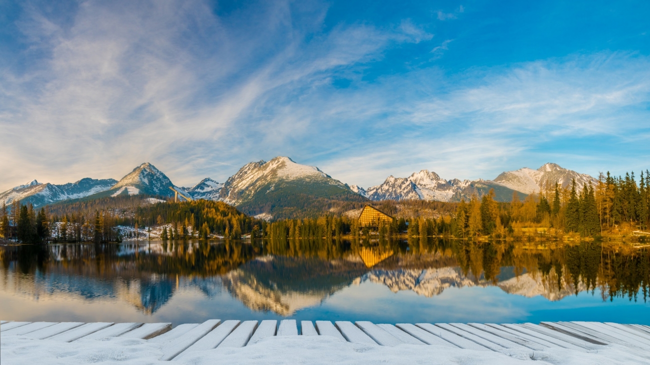 Panorama of high resolution mountain lake Strbske Pleso in Slovakia, lake in winter scenery